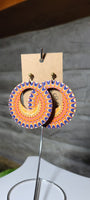 Lightweight round wooden earring studs with round cutout, orange yellow blue sunburst, double sided